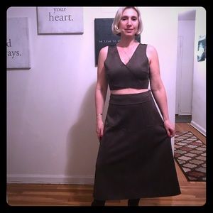 Crop top and long skirt costume.